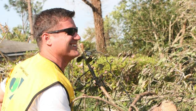 Mormons are good citizens. Man working on storm cleanup