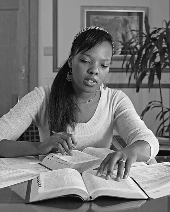 Mormon woman studying scriptures